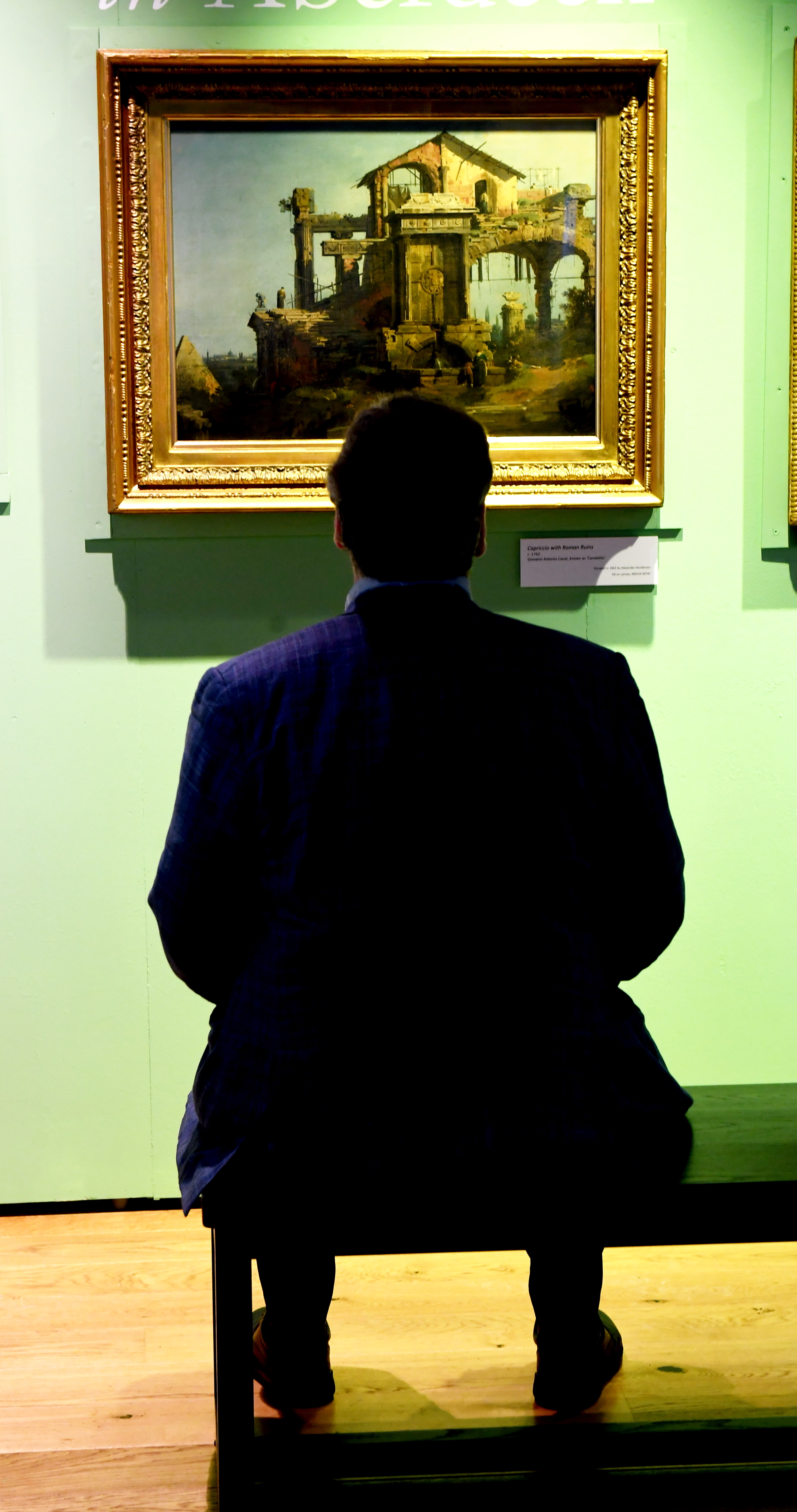 Art lecturer John Gash admires the Canaletto painting at Aberdeen University