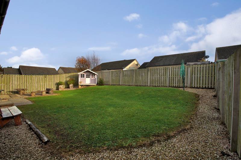 Rear Garden: Laid to lawn with a large paved patio area ideal for outdoor entertaining