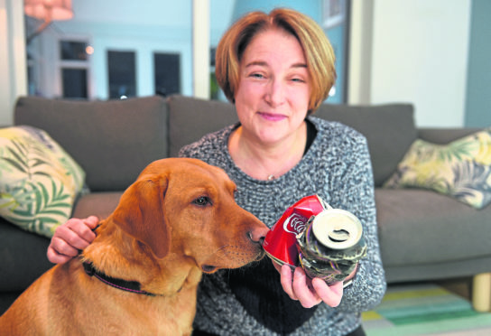 Marion Montgomery with her Labrador, Paddy.