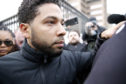 FILE - Actor Jussie Smollett Suspended From US TV Series Empire CHICAGO, ILLINOIS - FEBRUARY 21: Empire actor Jussie Smollett leaves Cook County jail after posting bond on February 21, 2019 in Chicago, Illinois.  Smollett has been accused with arranging a homophobic, racist attack against himself in an attempt to raise his profile because he was dissatisfied with his salary.  (Photo by Nuccio DiNuzzo/Getty Images)
