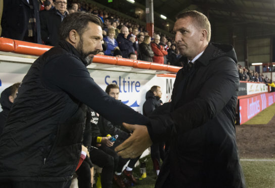 Aberdeen manager Derek McInnes (left) with Brendan Rodgers.