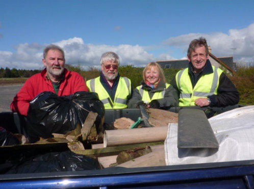 George Niblock (right) with other AEF volunteers