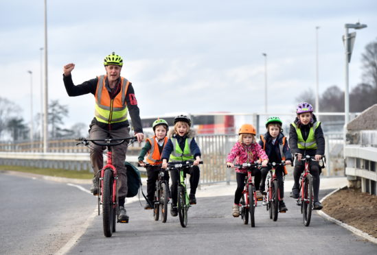 AWPR in Milltimber, Cyclists on the new bike path.


Pictured are Carl Gerrard, Arran Williams, Isla Gerrard, Katy Hay, Rowan and Leya Oren-Woods.