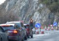 Picture by SANDY McCOOK    15th February '17
Work by Bear Scotland has begun to clear and stabalise the rock face above the A82 north of Drumnadrochit.