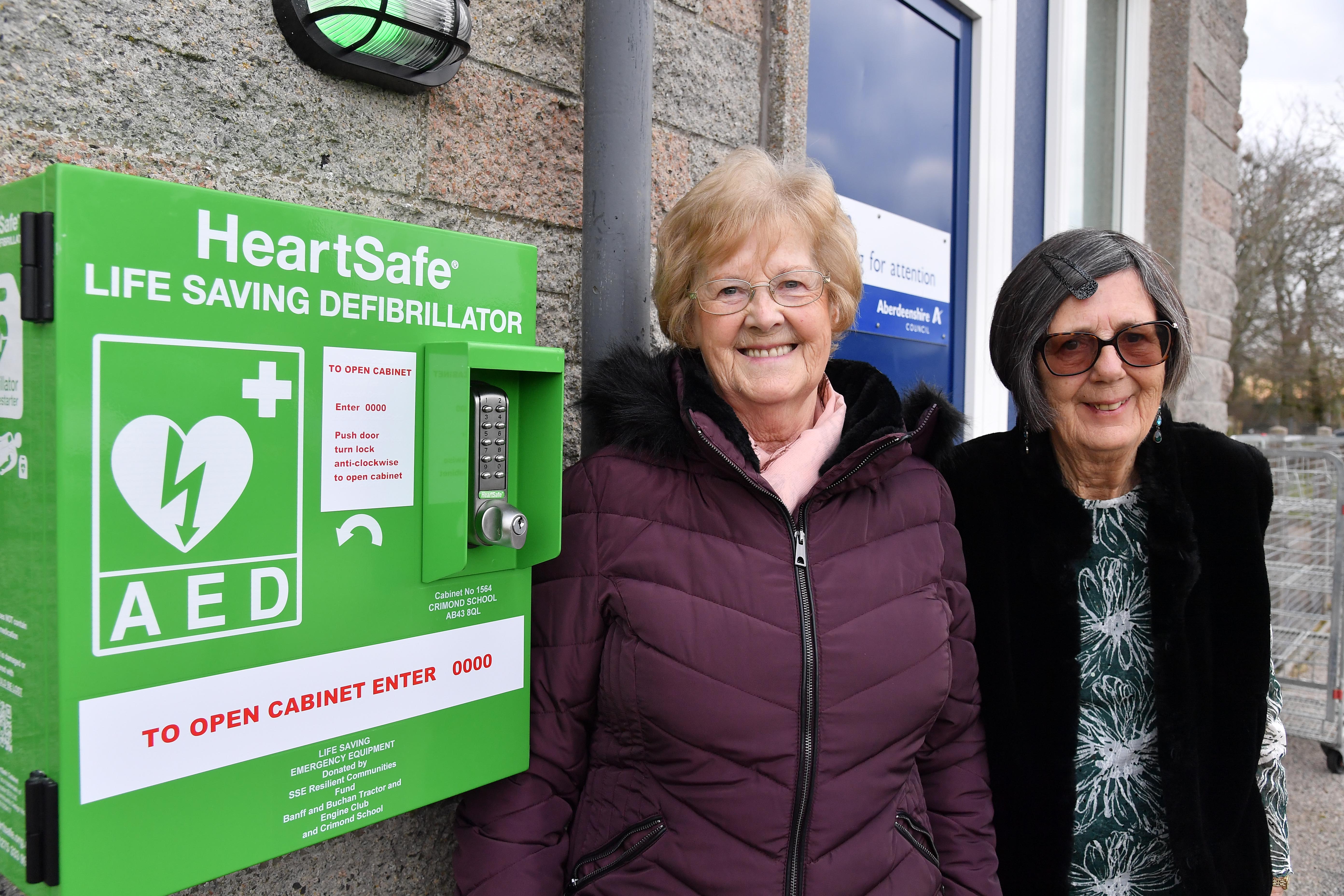 Catra vice chairwoman Rita Cartney and chairwoman Julie Pickering with the new defibrillator at Crimond Primary School.