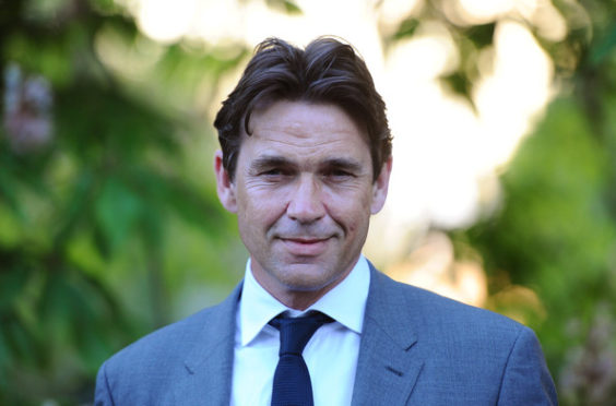 Actor Dougray Scott has spoken about his father's Parkinson's disease.