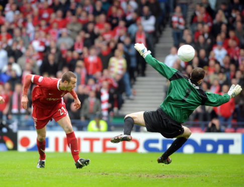 Andy Considine nets the second goal against Queen of the South in 2008.