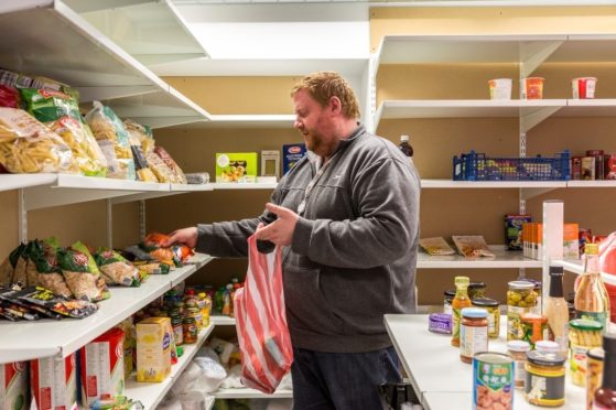 A man in the pantry at CFINE