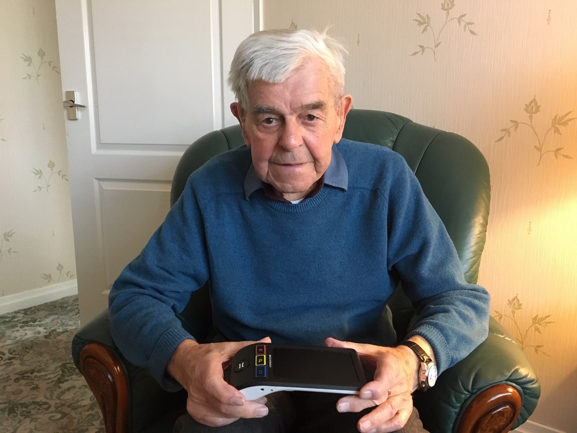 Harry Black with his electronic magnifier.
