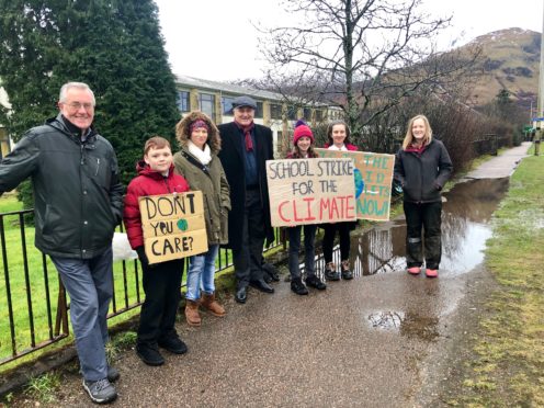 MSP John Finnie joins Holly Gillibrand and fellow students in strike outside Lochaber High School.