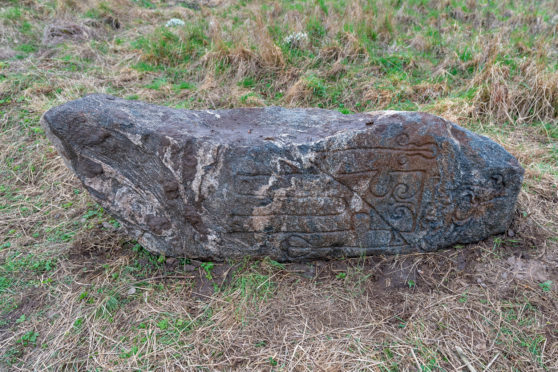 Wayne Miles found that the large Granite Stone had pictish type engraving on it.