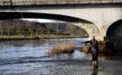 Aberdeenshire Provost Bill Howatson makes the first official cast of the season at Port Elphinstone.