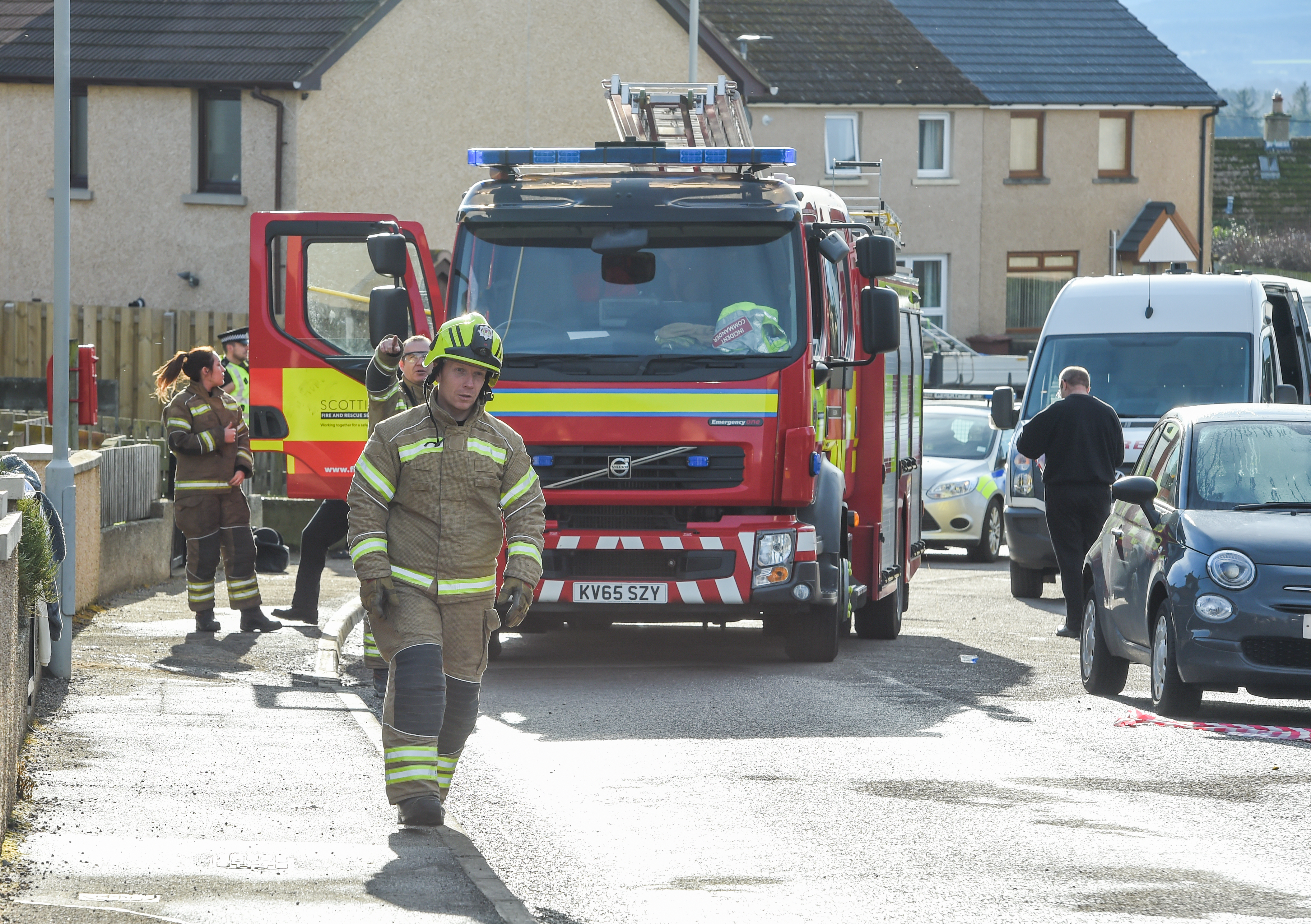Fire crews at the damaged property in Lossiemouth.