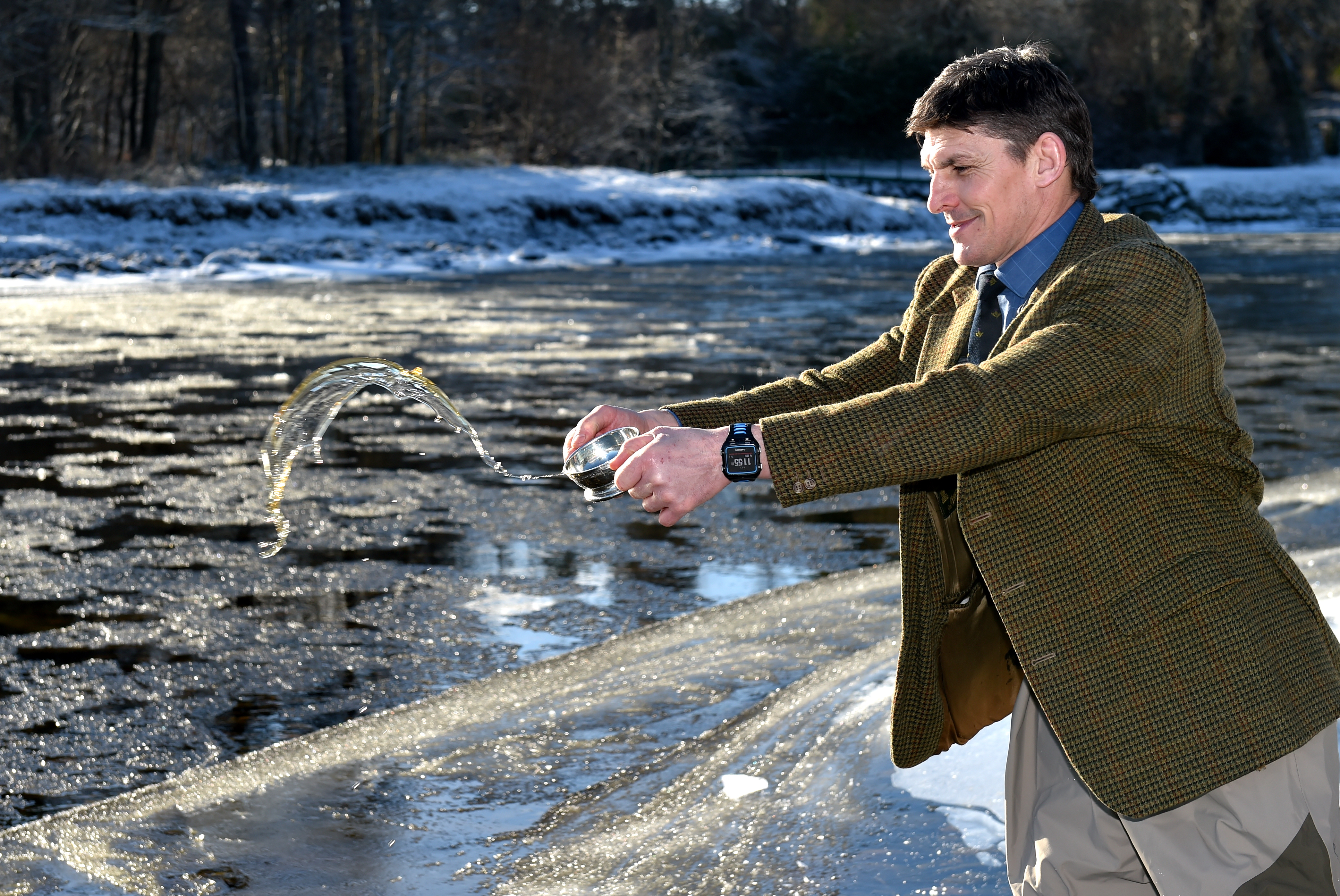 Rob Wainwright making the first cast on the River to mark the start of the salmon season.