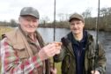 Anglers and club members, John Brocklehurst and Jim Braithwaite toast to a successful season ahead.