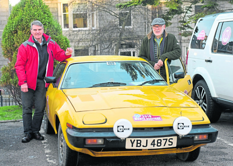 Duncan Massie and Ron Adam with their Triumph TR7. Picture by Kath Flannery.