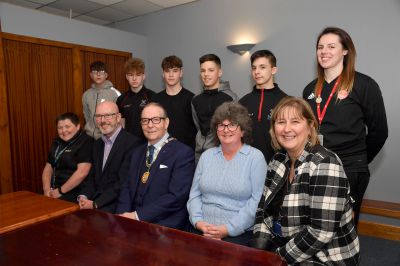 At the celebration of the PeterDeen scheme in February earlier this year are (seated L to R) Lynne Gordon, senior community learning worker, Ally Prockter, CEO, Aberdeen FC community trust, councillor Ron McKail, deputy provost, councillor Gillian Owen and Shona Sellers, Peterhead Academy head teacher. (Rear L to R) Pupils Aiden Whyte, Lewis Buchanan, Aidan Hendry, Kieran Smith, Jacob Knight and Lois Walker, community projects officer.