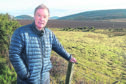 Black Isle councillor Gordon Adam at an area of land off the Allangrange road near Munlochy.
