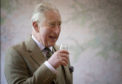 The Prince of Wales, known as the Duke of Rothesay while in Scotland, takes part in a whisky tasting during a visit to the Royal Lochnagar Distillery at Crathie.