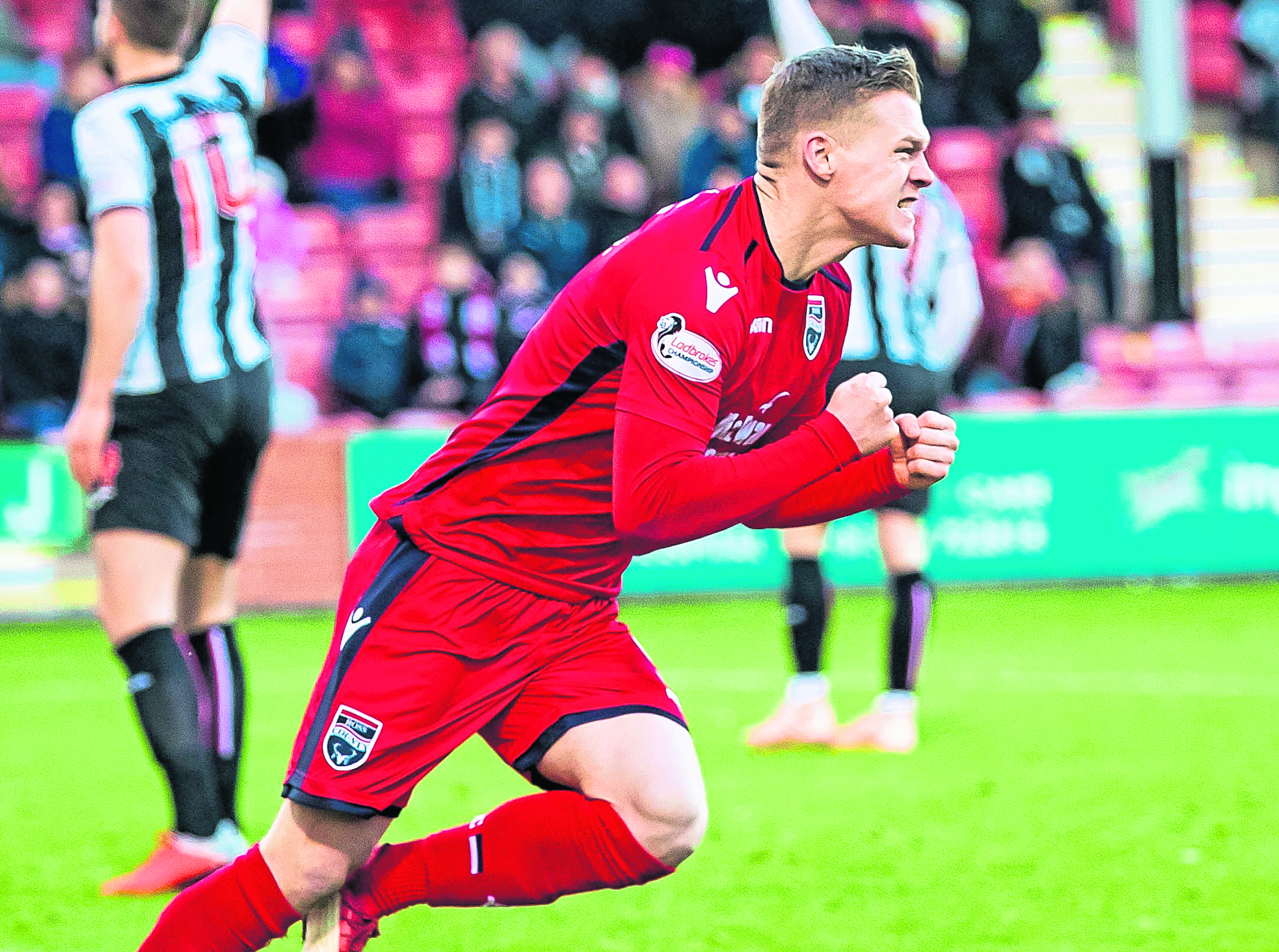 Ross County's Billy McKay celebrates after scoring to make it 1-1.