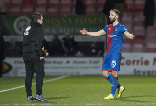 Scott Kellacher and Caley Thistle midfielder Sean Welsh.