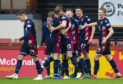 Ross Stewart is congratulated after putting Ross County in front.