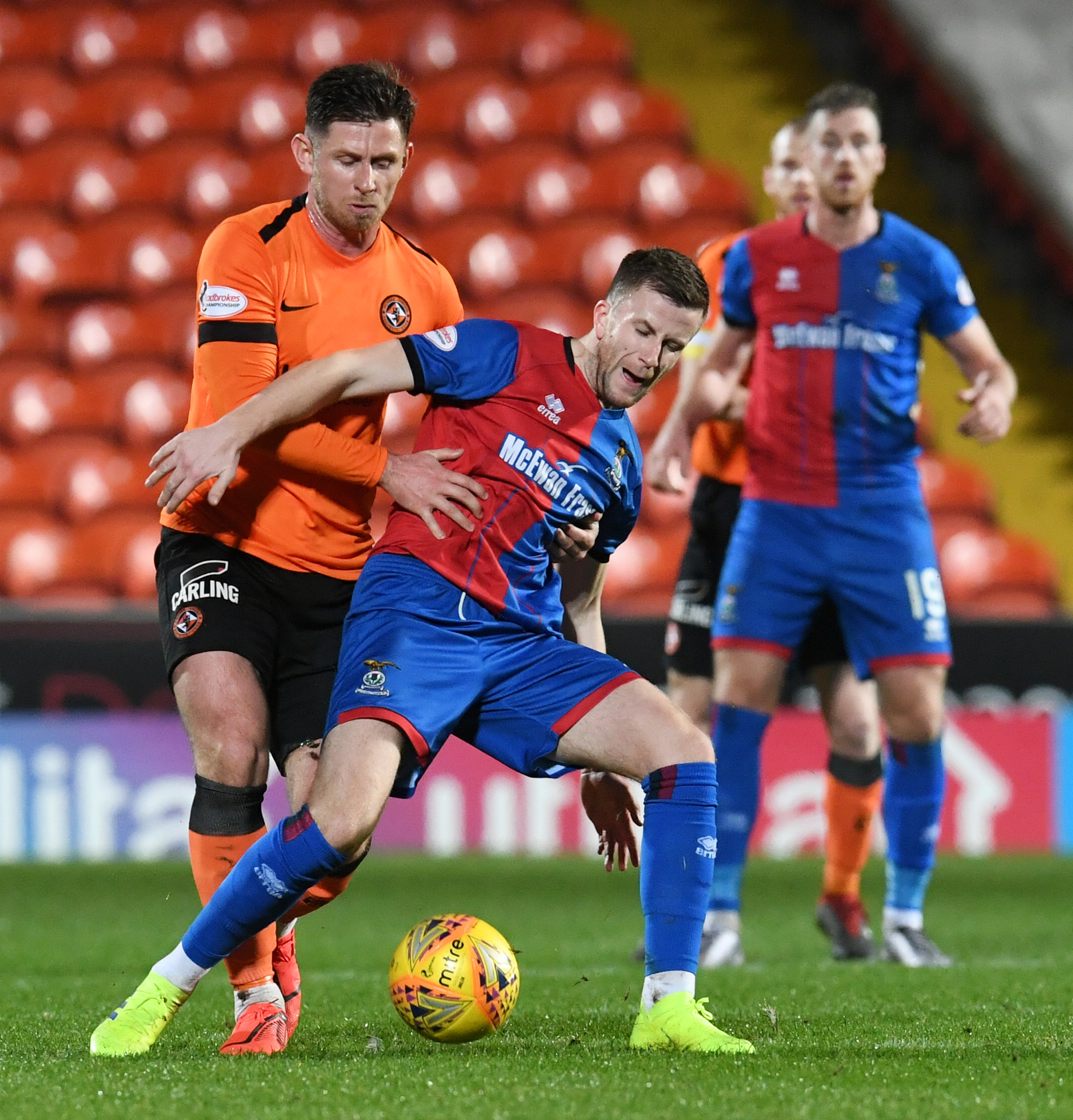 Caley Thistle midfielder Liam Polworth holds off Dundee United's Callum Butcher