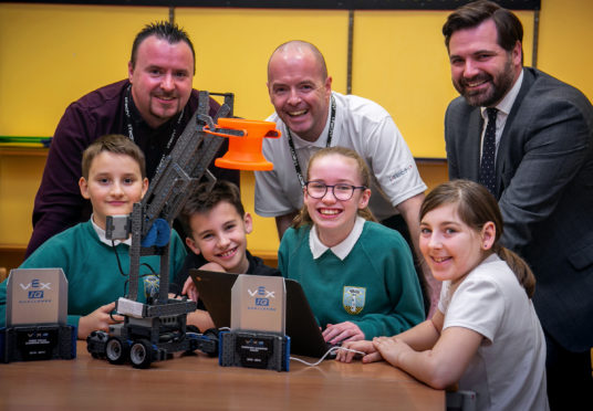 Back L-R: John Mackay, Craig Flockhart of i-Tech Services with Councillor John Wheeler and some of the Tullos finalists.