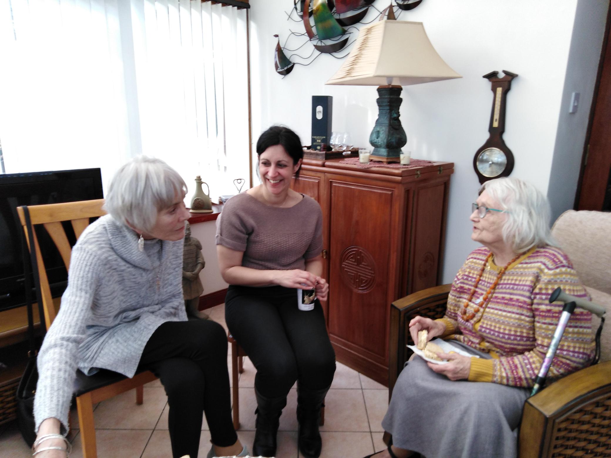 Volunteers Lynda Cameron (L) and Lorna Cameron with guest Peggy at launch of Contact the Elderly's Buckie group