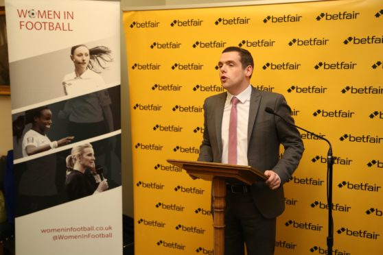 Douglas Ross speaking at the Women in Football reception
