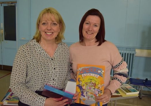 Left to right: SHaron Hall from Dyslexia Routes showing mum Rachael Smith some resources which can help those with dyslexia