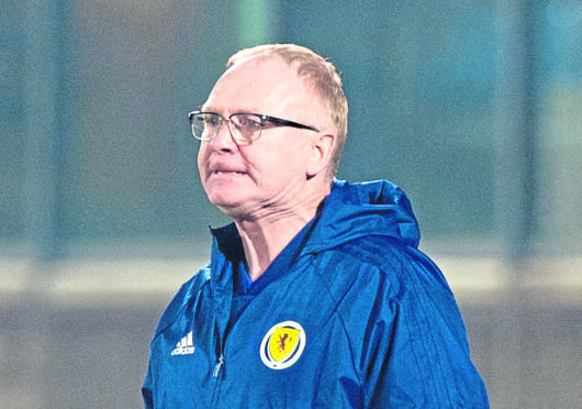 Scotland manager Alex McLeish shows his frustration as his side struggle to find a second goal