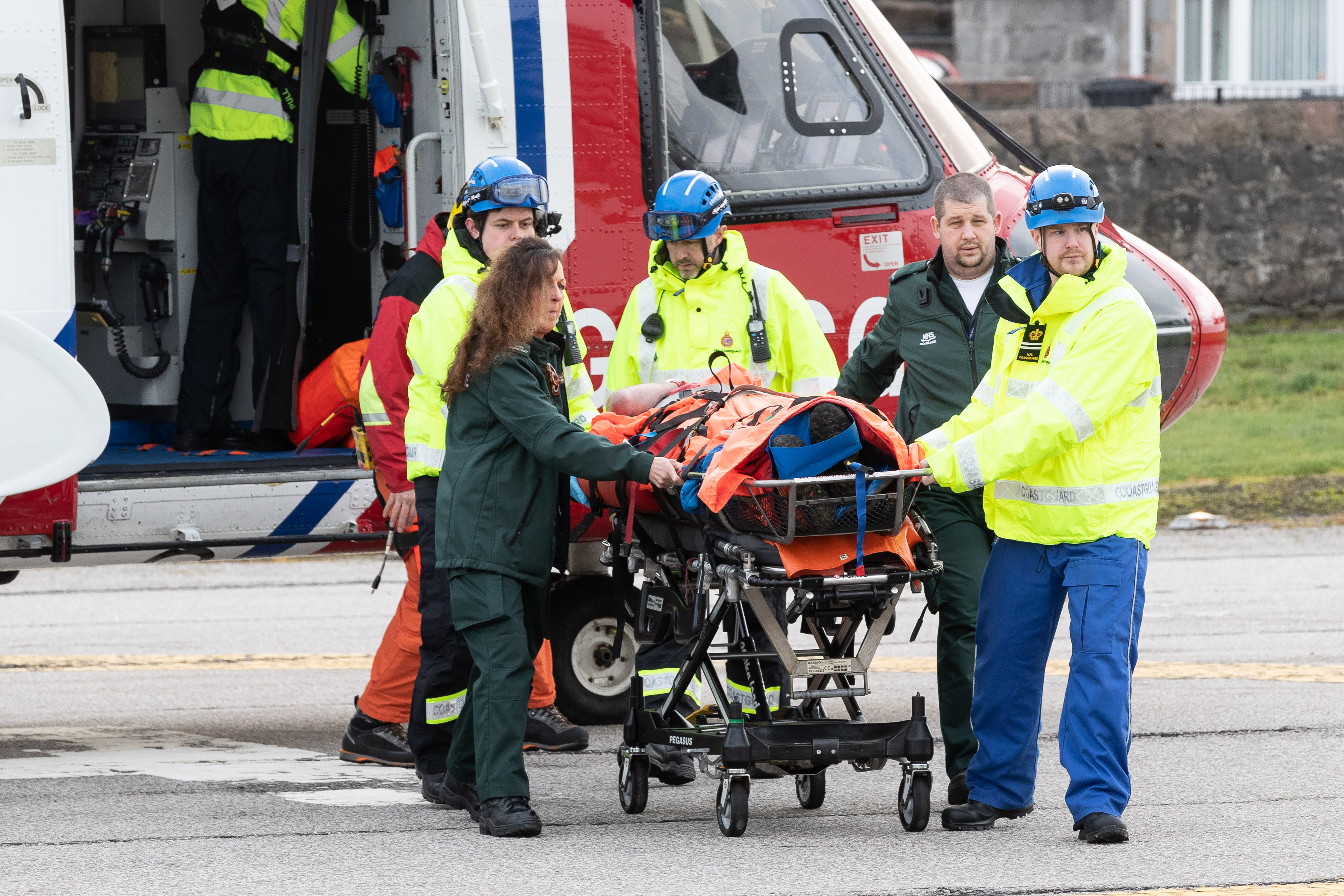 A paraglider pilot was airlifted to hospital after crashing into a hillside. (Derek Ironside/Newsline Media)