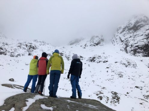 Nathalie, Marc, Graeme of Scottish Avalanche Information Service (SAIS) and Laurent below the site of the incident.