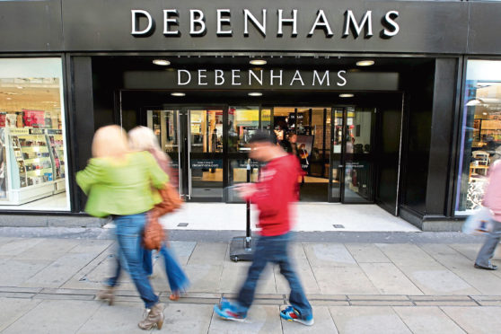 File photo dated 18/03/11 of a Debenhams store. A surge in sales in the final week before Christmas helped the department store chain weather tough autumn trading today. PRESS ASSOCIATION Photo. Issue date: Tuesday January 10, 2012. The company, which has 170 stores in the UK, Ireland and Denmark, said warmer weather throughout October and November impacted sales until a record Christmas week left trading for the 18 weeks to January 7 level on a year ago. See PA story CITY Debenhams. Photo credit should read: Dave Thompson/PA Wire