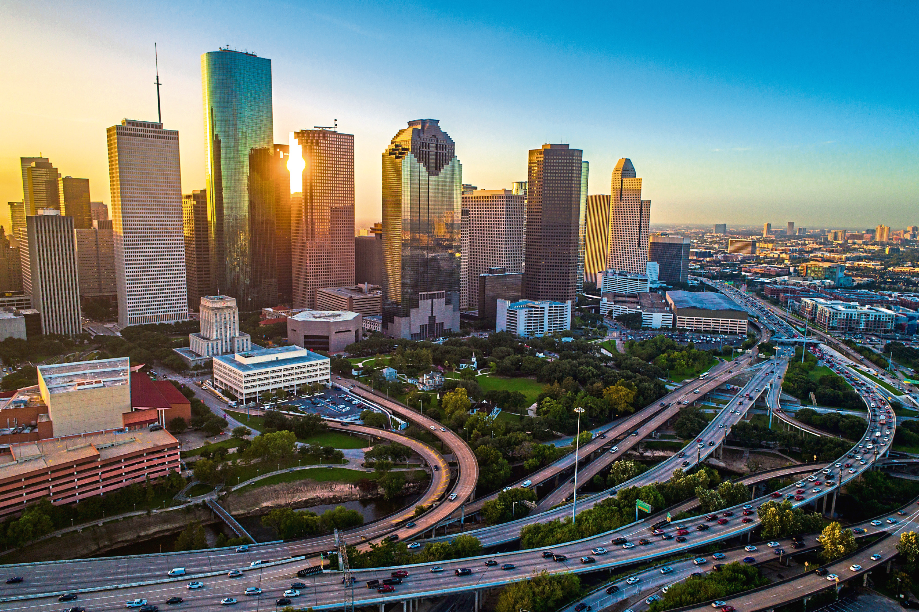 Houston - istock
- Houston Texas aerial drone sunrise view cityscape skyline colorful morning downtown  - highways , traffic , office buildings and high rises Home sales and modern architecture of the Houston real estate market - new modern homes for sale on Houston Texas on a sunny day