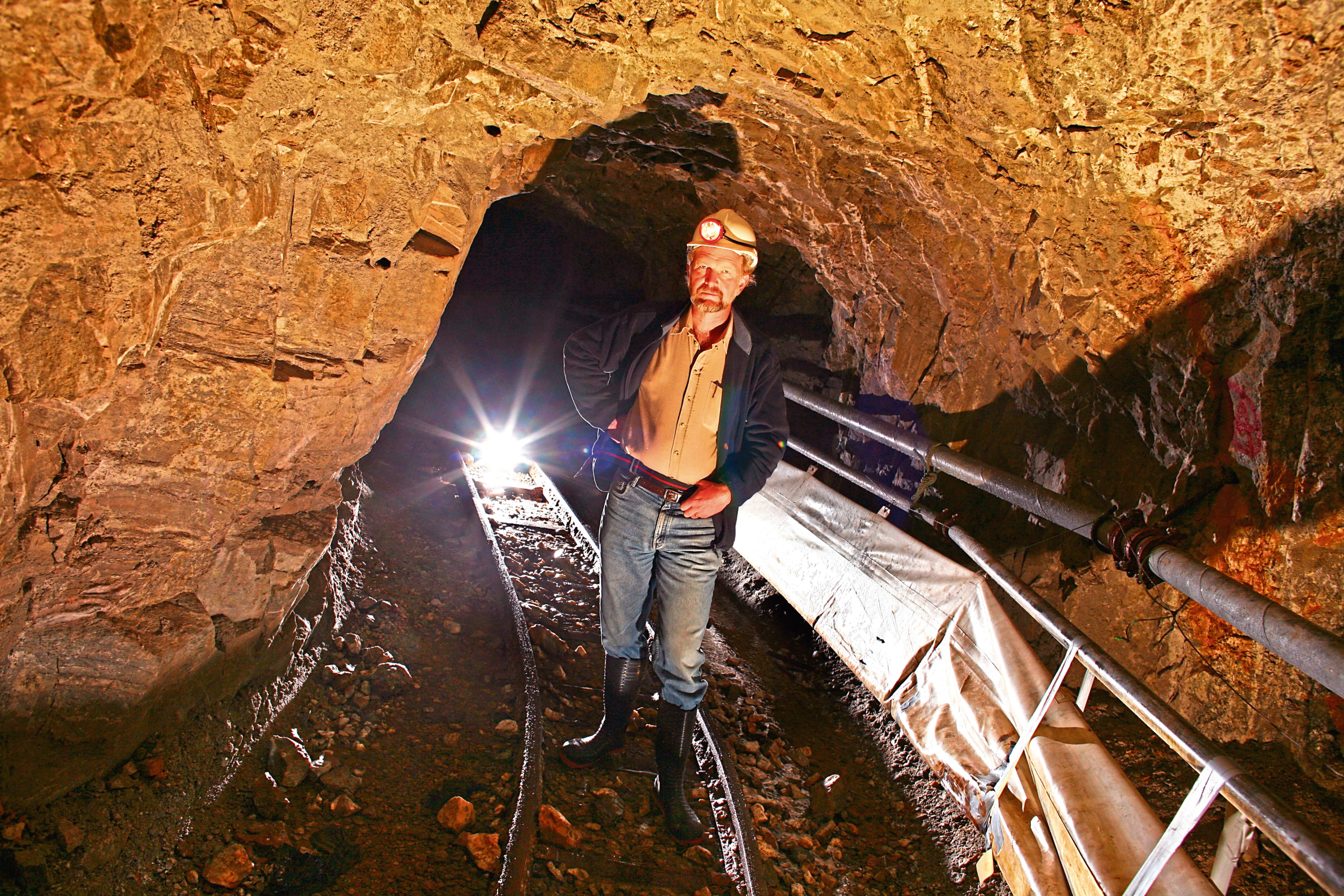 Biz Chris Sangster
CRIANLARICH, UNITED KINGDOM - JULY 22:  Chris Sangster, chief executive of Scotgold inspects the Tyndrum gold mine on July 22, 2008 in Tyndrum Scotland. The company is eagerly awaiting planning permission to start extracting an estimated 70 million GBP worth of gold from the hills. With the current weakness in the economy, combined with fears of inflation pushing the price of gold to record heights, it makes potential mining in Scotland economically viable.   (Photo by Jeff J Mitchell/Getty Images)