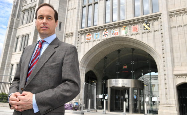 Councillor Martin Greig outside Marischal College.