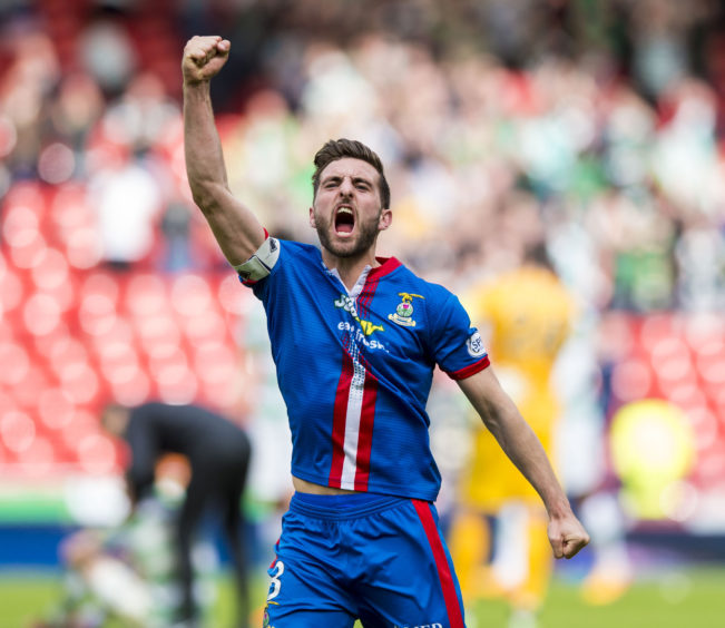 Inverness captain Graeme Shinnie celebrates at full-time.