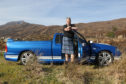 Brad Collins with his Ford FPV BA MkII Pursuit, photographed in Glen Affric.