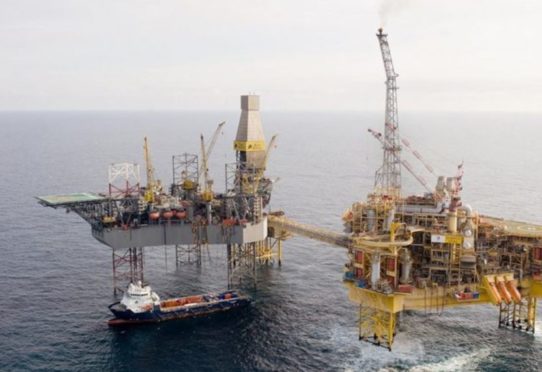 Total's Elgin PUQ platform, pictured right, alongside a Rowan rig.