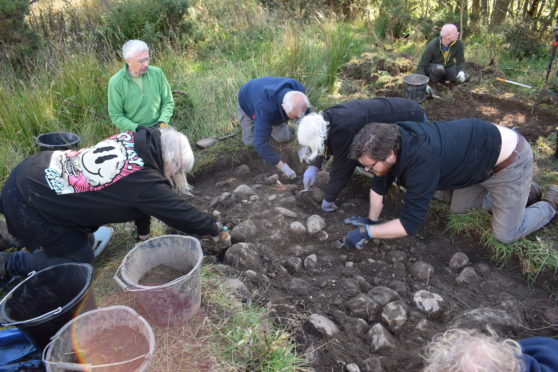 The researchers at the dig site