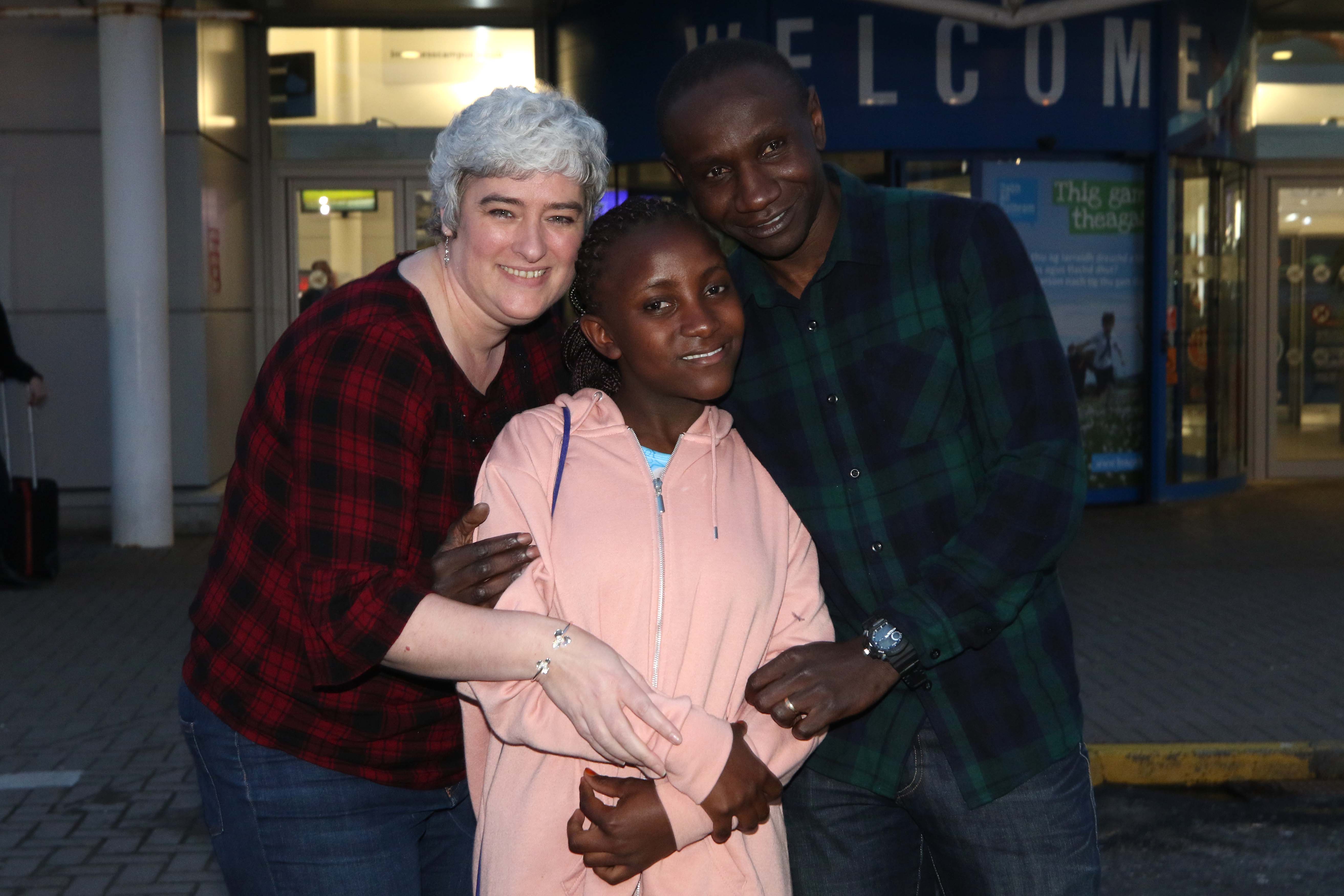 Black Watch soldier Lance-Corporal Denis Omondi and his wife Shelagh met Denis's daughter Anne at Inverness Airport, when she arrived from Kenya after an immigration battle.