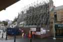 Demolition work yesterday began at the Eastgate Hostel in Inverness.