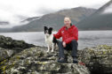 Philip GasKell of Search and Rescue Dog Association Scotland and his dog Jess.