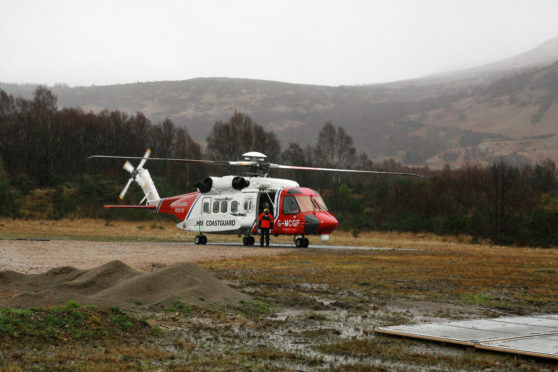 The coastguard search and rescue helicopter is also on scene helping with the rescue efforts.