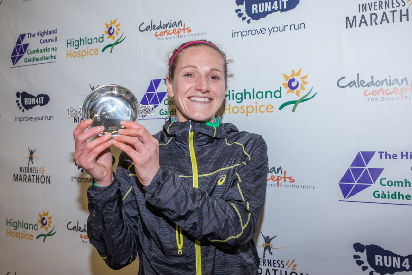 Liz Abbot wins the female  Inverness 1/2 Marathon in a time of 1:16:52.