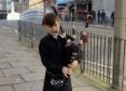 Josh Bruce, 10, performing in Aberdeen city centre.