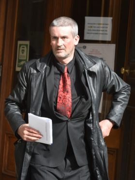 Kevin Robertson leaves Aberdeen Sheriff Court.