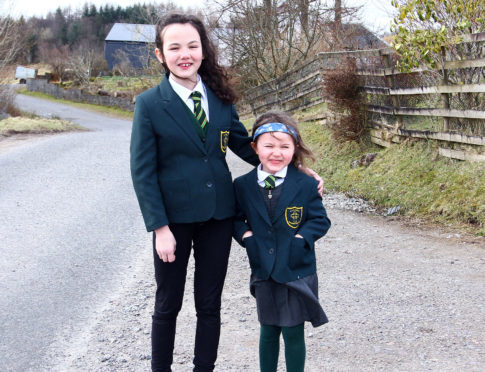 Sophie and Lucy MacGregor at Ardconnel farm where the bus used to pick them up